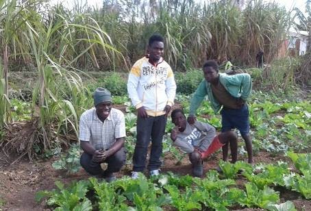 Ephraim, Sam and boys from the community